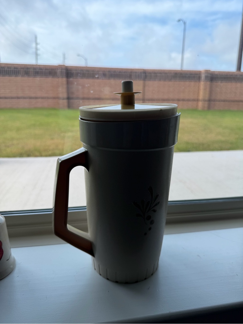 Cream Plastic Tupperware Pitcher with Beige Lid